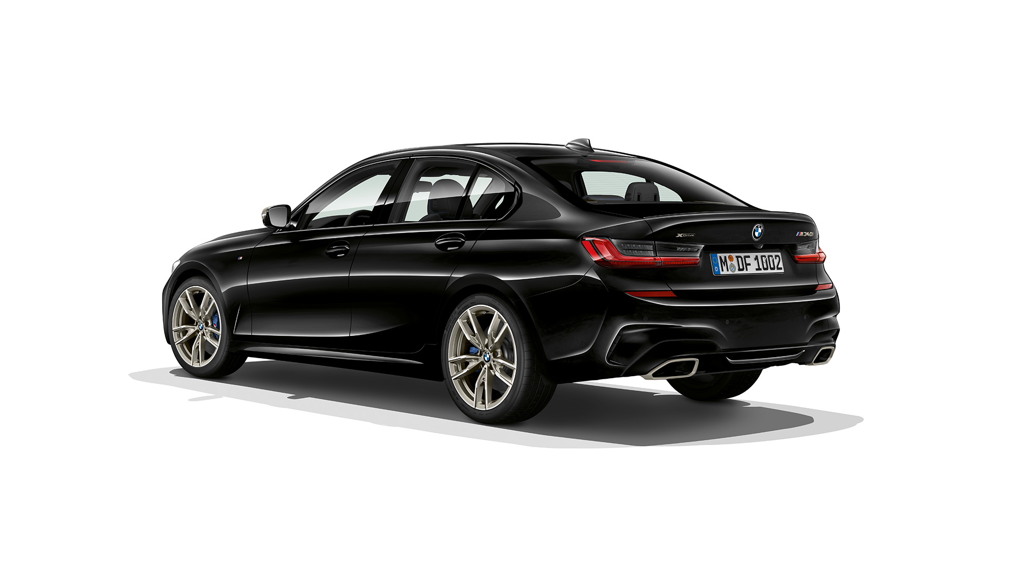 BMW Σειρά 3 Sedan, πίσω τμήμα M340i xDrive. Πίσω λήψη τριών τετάρτων της BMW Σειράς 3 M340i xDrive Sedan.