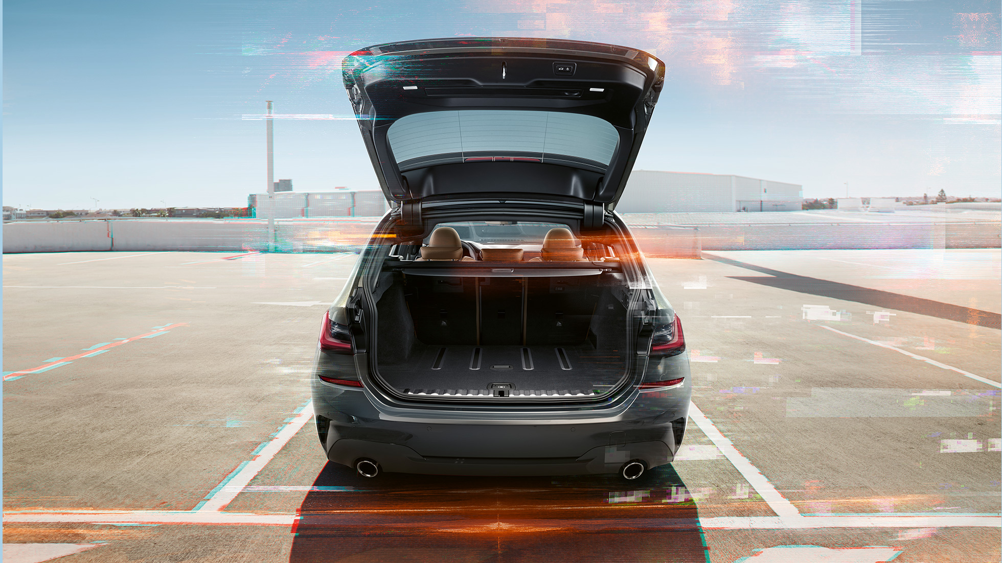 BMW Σειρά 3 Touring, πίσω λήψη με ανοικτή πόρτα χώρου αποσκευών BMW Σειρά 3 Touring, πίσω λήψη με ανοικτή πόρτα χώρου αποσκευών σε χώρο στάθμευσης, σε αστικό περιβάλλον
