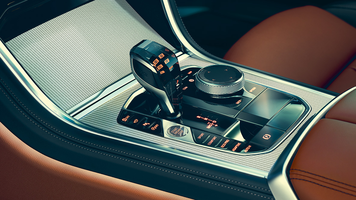 BMW Σειρά 8 Coupé, κεντρική κονσόλα. Κοντινή λήψη του εσωτερικού της BMW Σειράς 8 Coupé με εστίαση στην κεντρική κονσόλα.