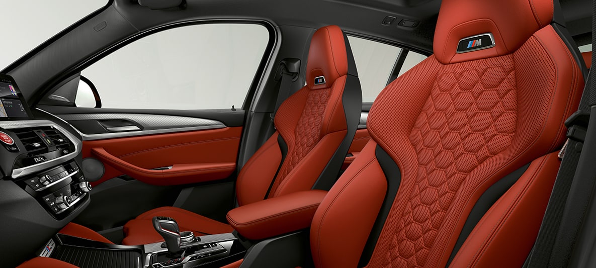 BMW X4 M, σπορ καθίσματα με δέρμα 'Merino' σε πορτοκαλί Sakhir. BMW X4 M, εσωτερικό, σπορ καθίσματα με δέρμα 'Merino' σε πορτοκαλί Sakhir.