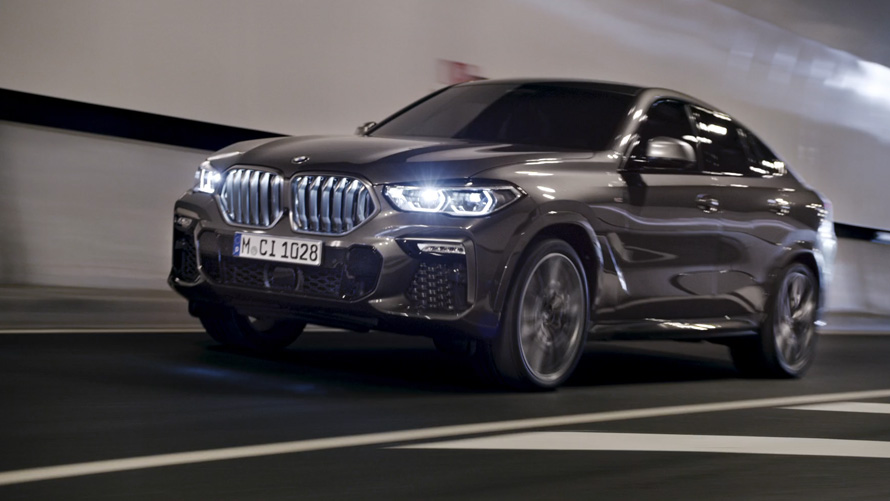 Μπροστινή λήψη τριών τετάρτων, BMW X6, G06, 2019 BMW X6, G06, 2019, μπροστινή λήψη τριών τετάρτων, κινούμενη μπροστά από αστικό τοπίο