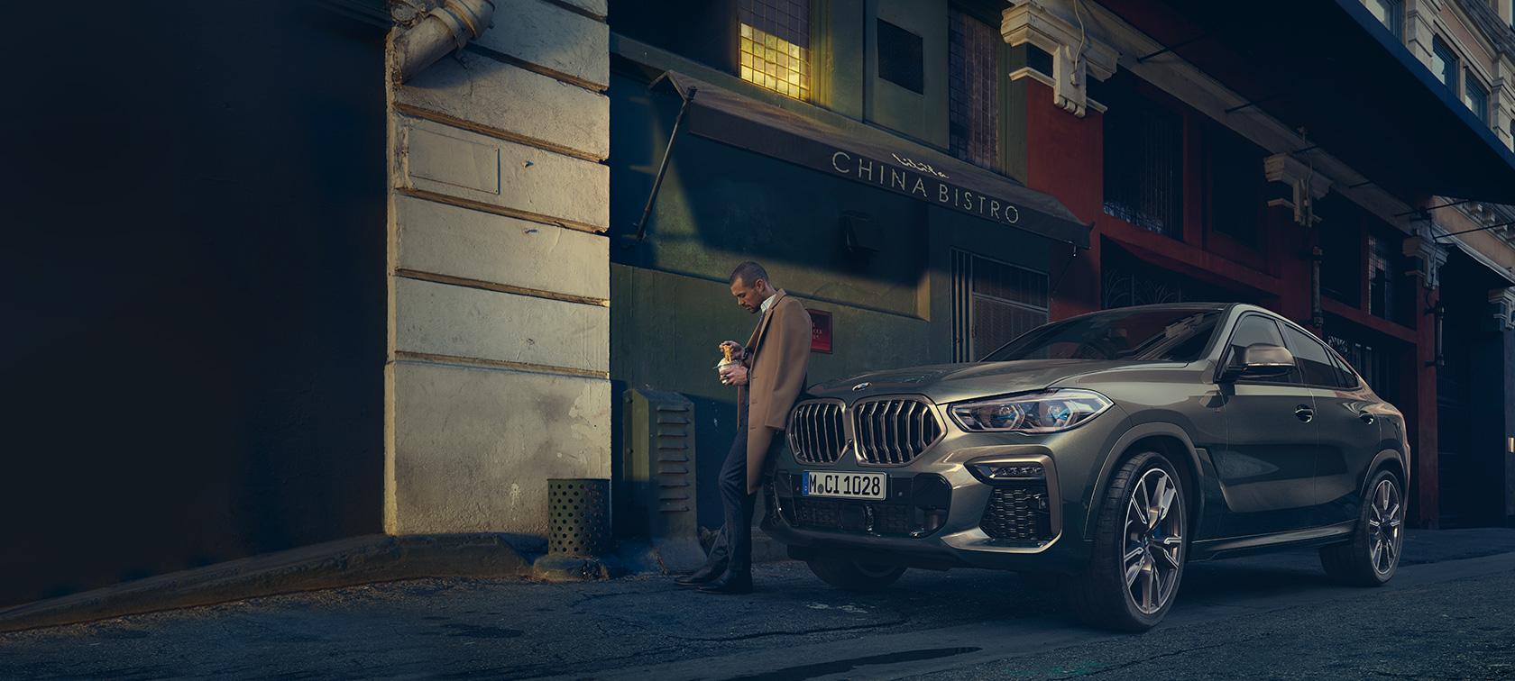 BMW Χ6, πίσω λήψη τριών τετάρτων, κινούμενη BMW X6, G06, 2021 Manhattan μεταλλικό, πίσω λήψη τριών τετάρτων, κινούμενη