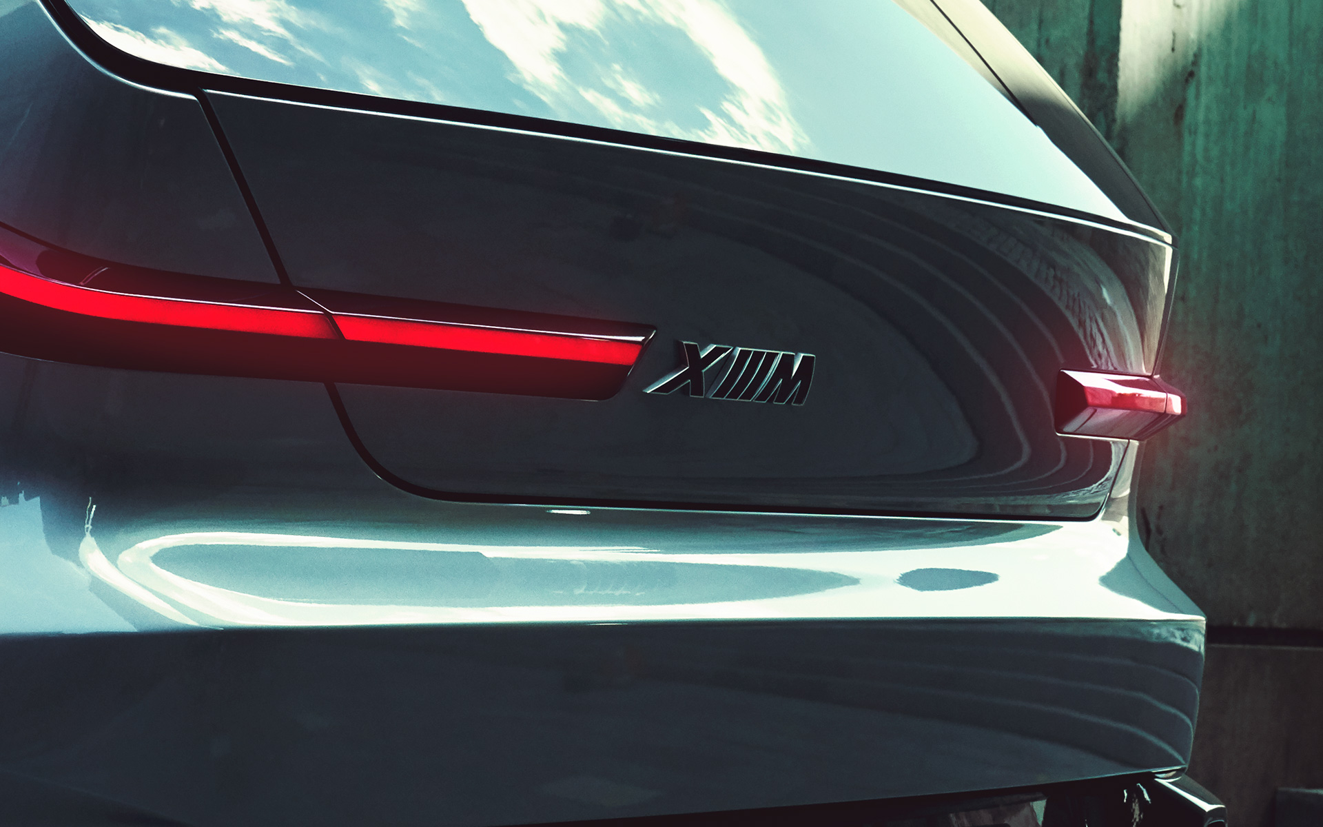 BMW Concept XM (G09) πίσω λήψη τρία τέταρτα, κοντινή λήψη στο λογότυπο XM BMW Concept XM (G09) πίσω λήψη τρία τέταρτα, κοντινή λήψη στο λογότυπο XM